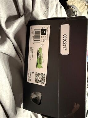 New in box Puma Black Shoe with Lime Green Sneaker